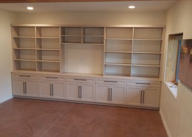 custom milled and white finished builtin entertainment center