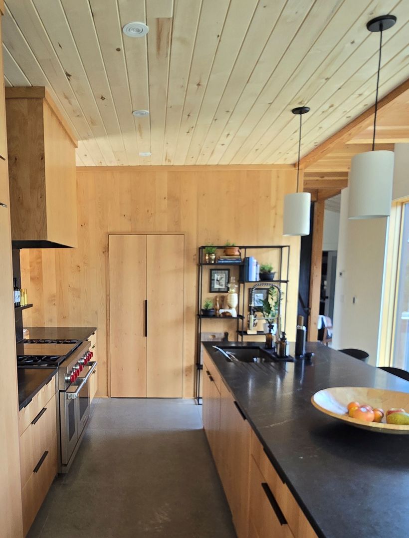 custom cabinets and pantry in large mountain home kitchen