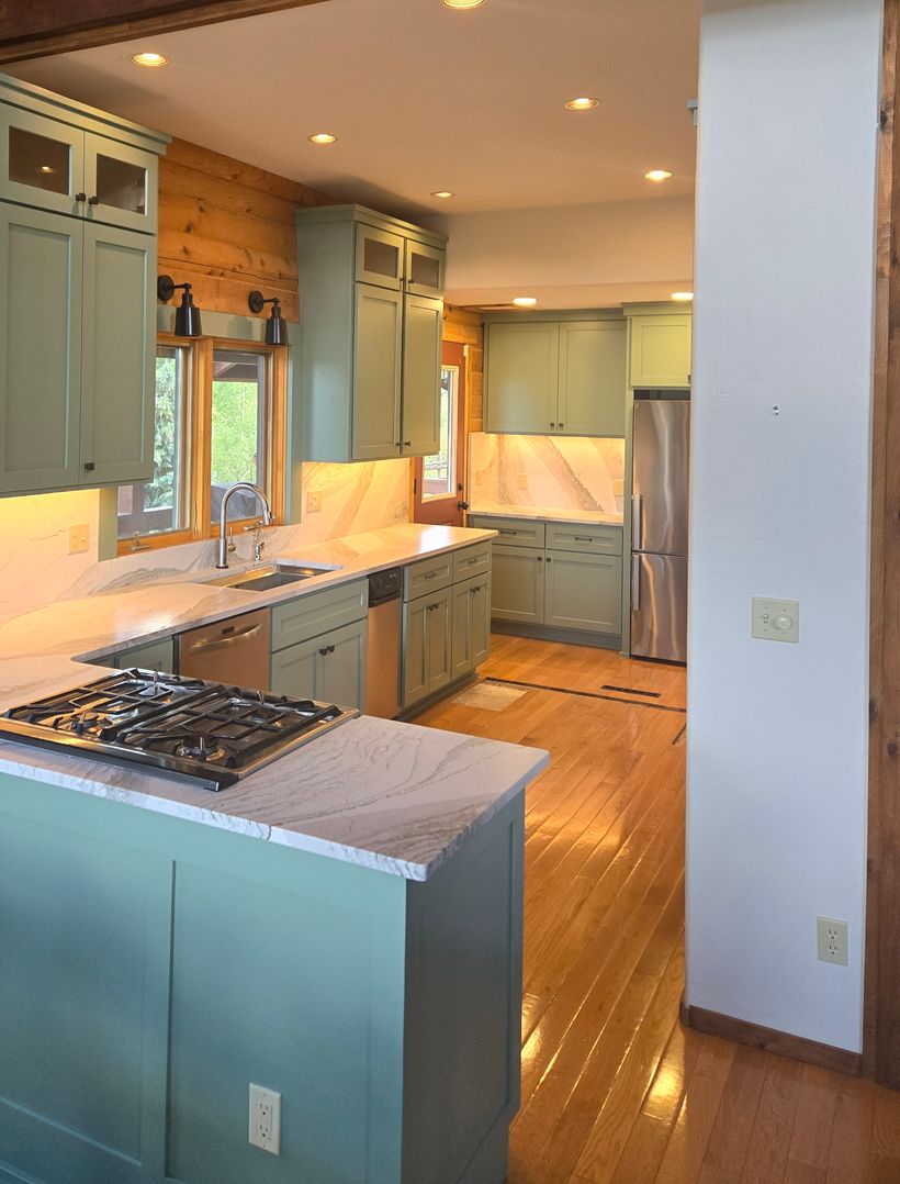 newly painted green kitchen cabinets