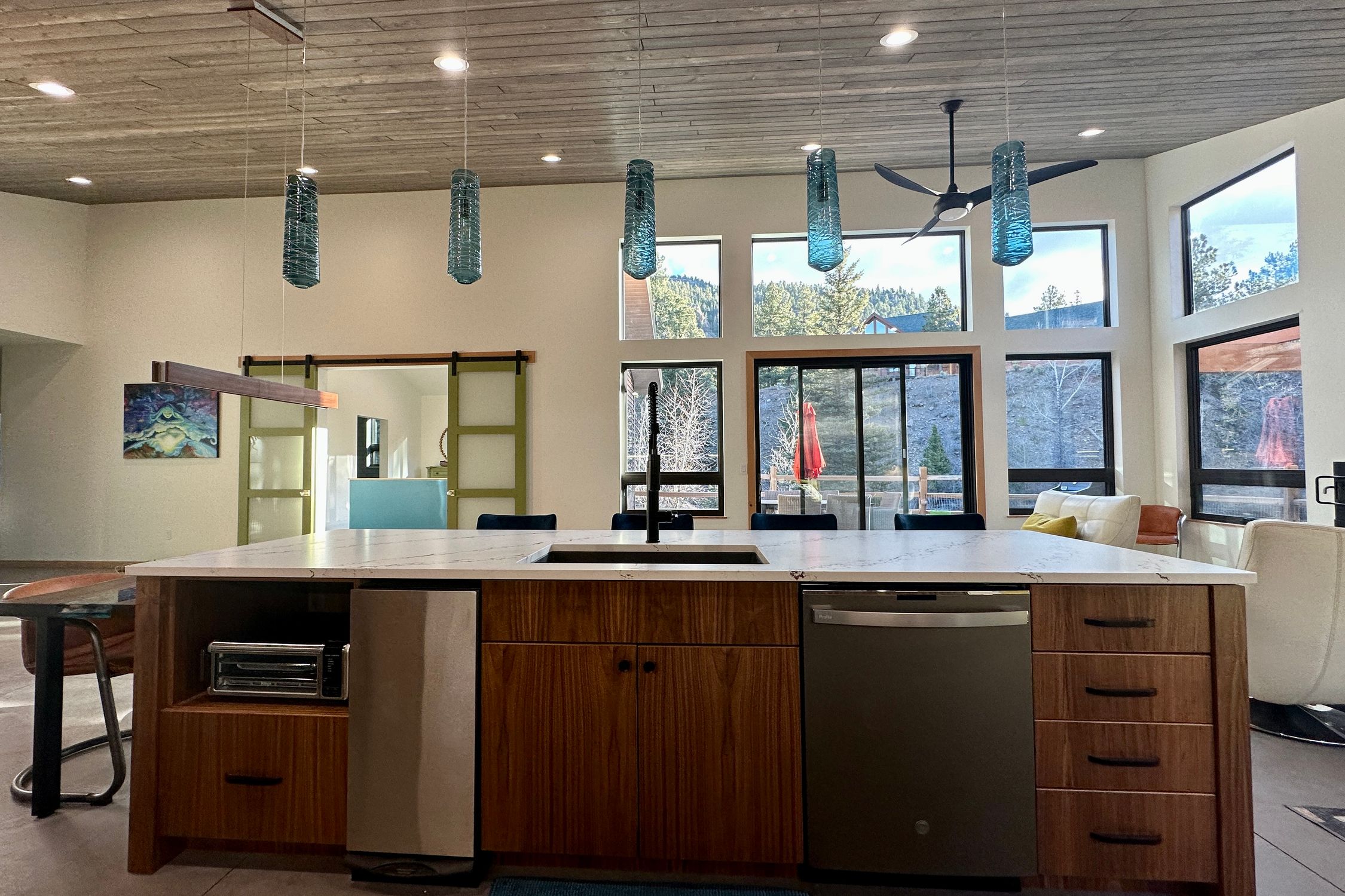 new custom designed and built kitchen cabinets in a bright modern mountain home